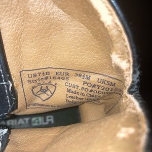 Black and red boots with gems, snack pattern, and flowers